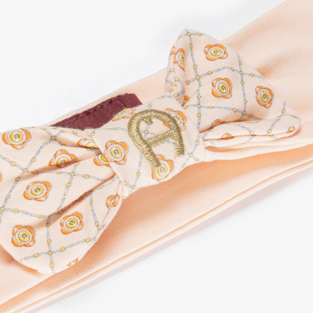AIGNER-Baby Girls Peach Pink Bow Headband with Gold Embroidery | Childrensalon Outlet
