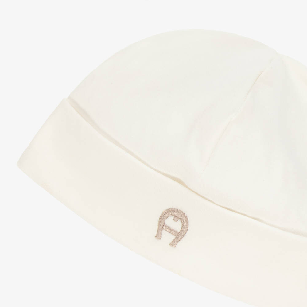 AIGNER-Ivory Pima Cotton Embroidered Logo Baby Hat | Childrensalon Outlet