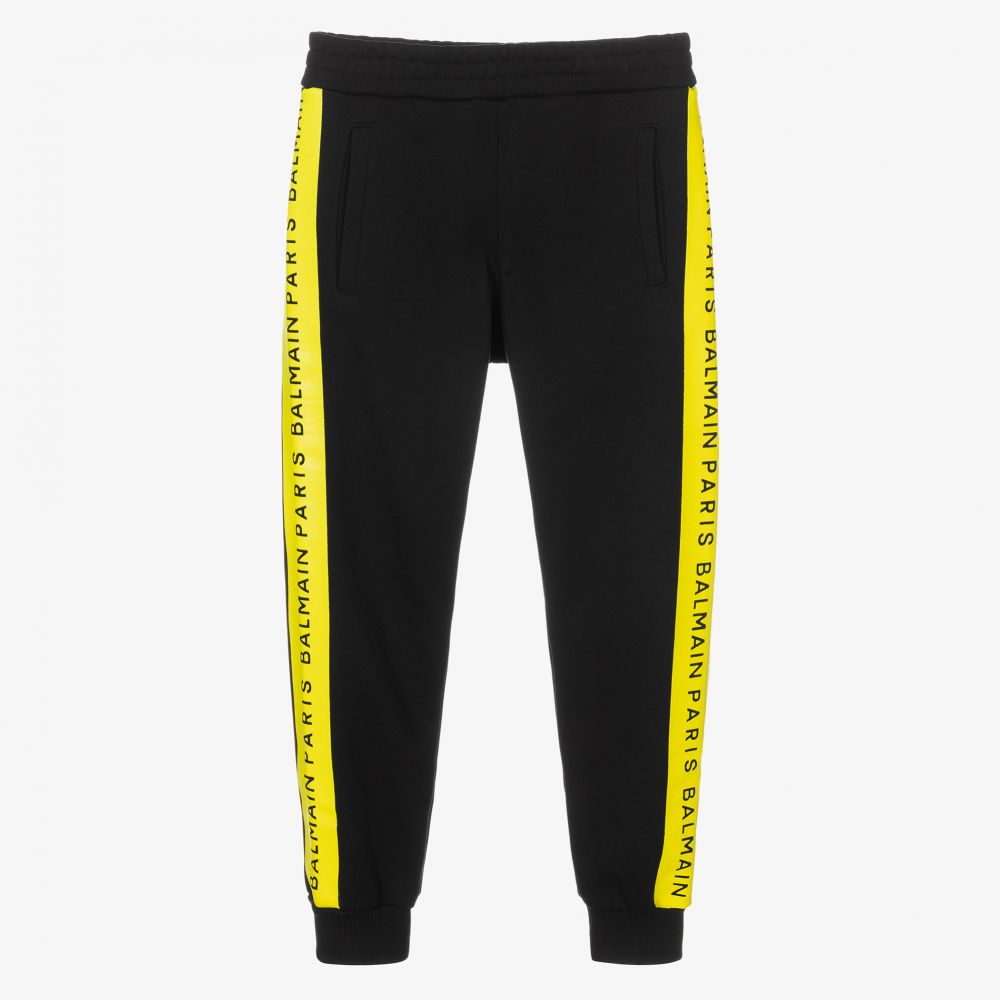 Black joggers with yellow stripe sales