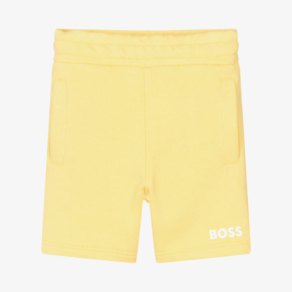 BOSS - Желтые хлопковые шорты с белым логотипом | Childrensalon