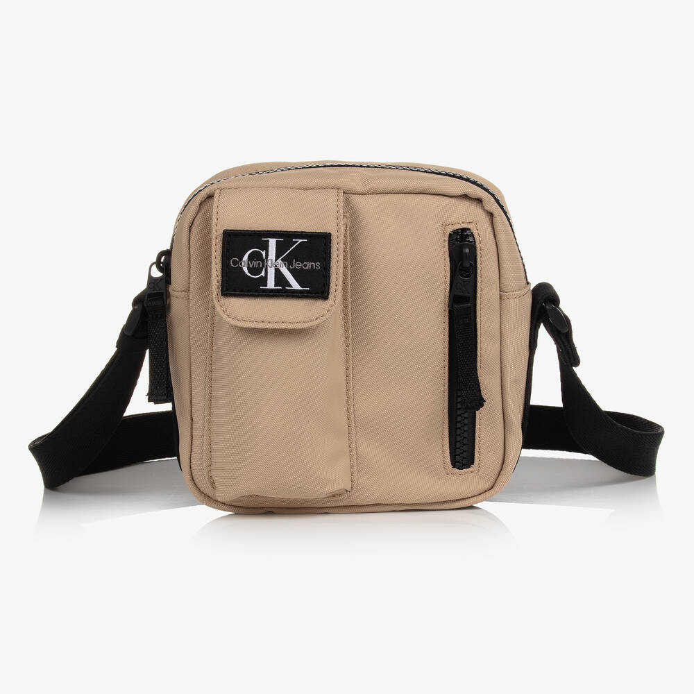 Calvin Klein - حقيبة كروس بادي كانفاس لون بيج (15 سم) | Childrensalon