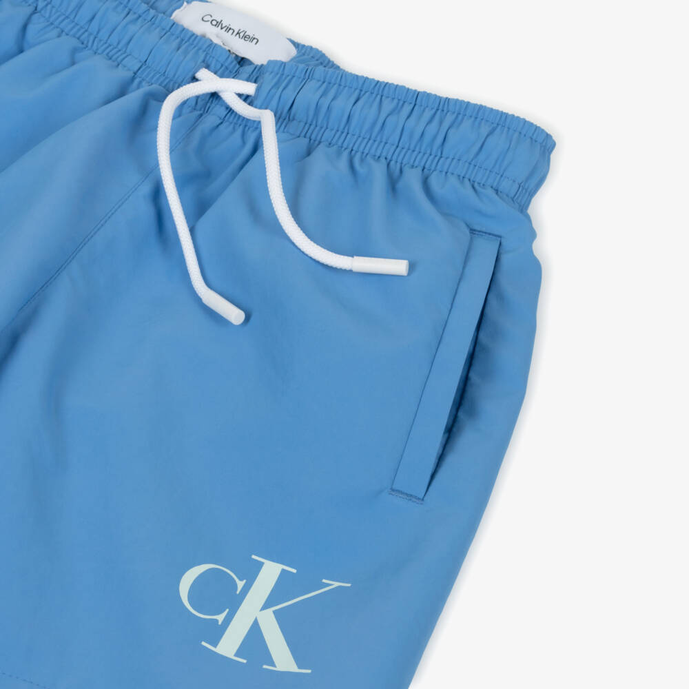 Calvin Klein-Boys Blue CK Monogram Swim Shorts | Childrensalon Outlet