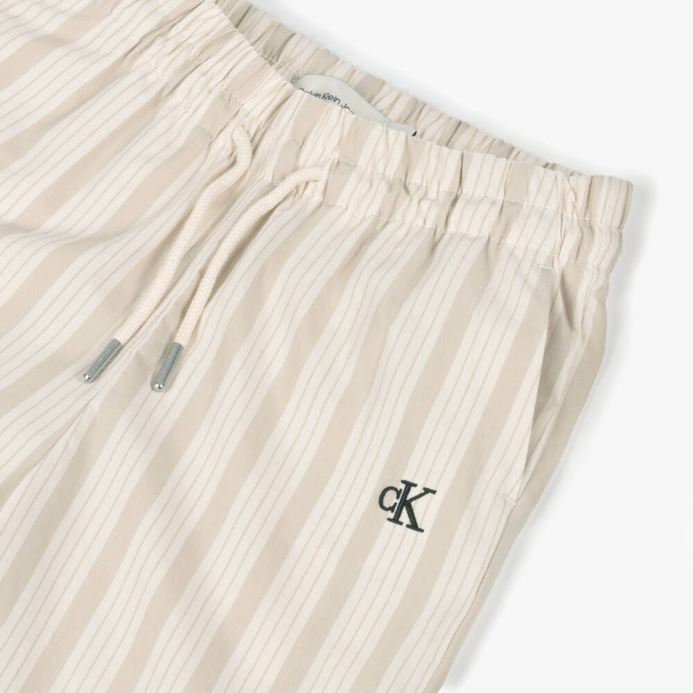 Calvin Klein-Girls Beige & Ivory Striped Cotton Trousers | Childrensalon Outlet