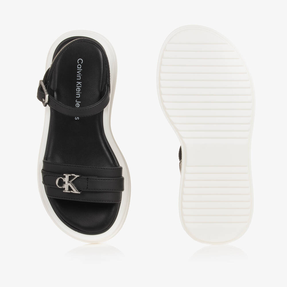 كالفين كلاين-صندل بلاتفورم جلد صناعي لون أسود وأبيض للبنات | Childrensalon Outlet