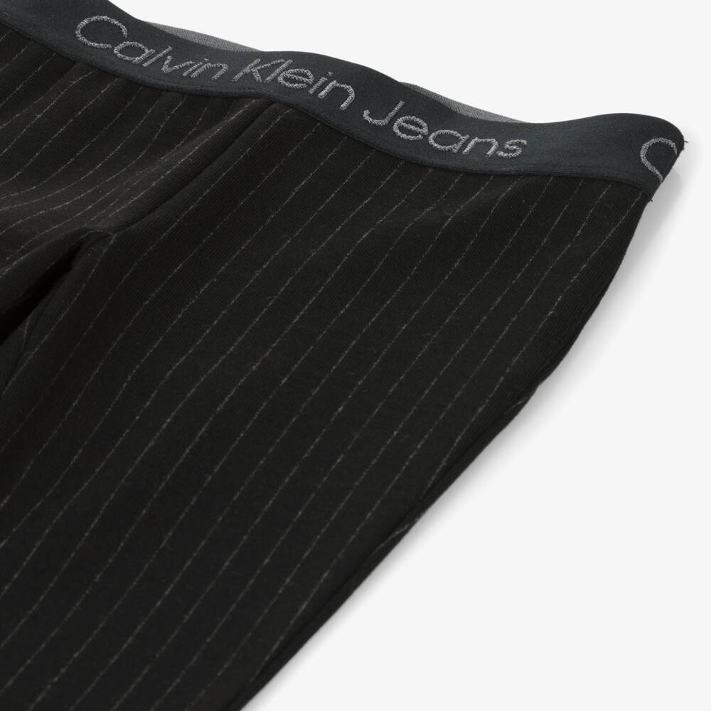 Calvin Klein-Girls Flared Black Pinstripe Trousers | Childrensalon Outlet