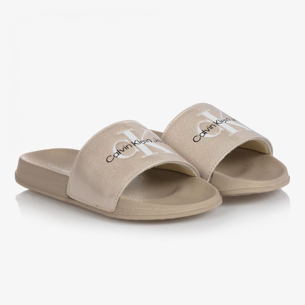 Calvin Klein Jeans - Girls Gold Logo Sliders | Childrensalon