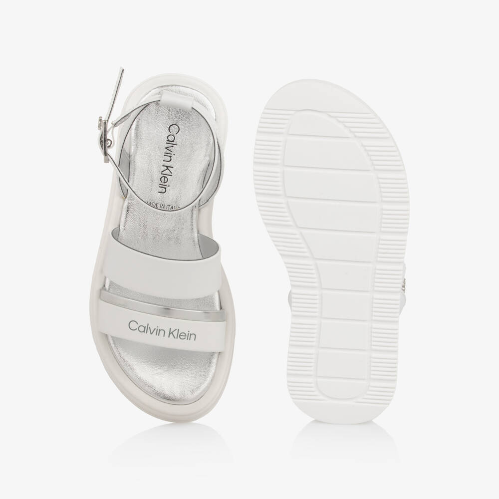Calvin Klein-Girls White Faux Leather Sandals with Silver Trims | Childrensalon Outlet