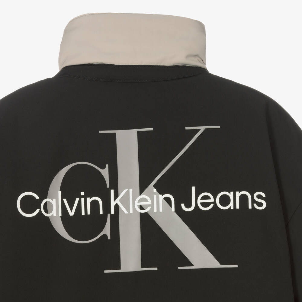Calvin Klein-جاكيت بوجهين تينز لون بيج وأسود | Childrensalon Outlet