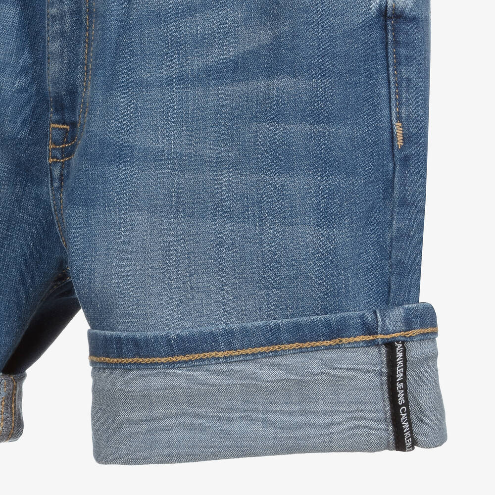 Calvin Klein Jeans-شورت تينز ولادي قطن دنيم لون أزرق | Childrensalon Outlet