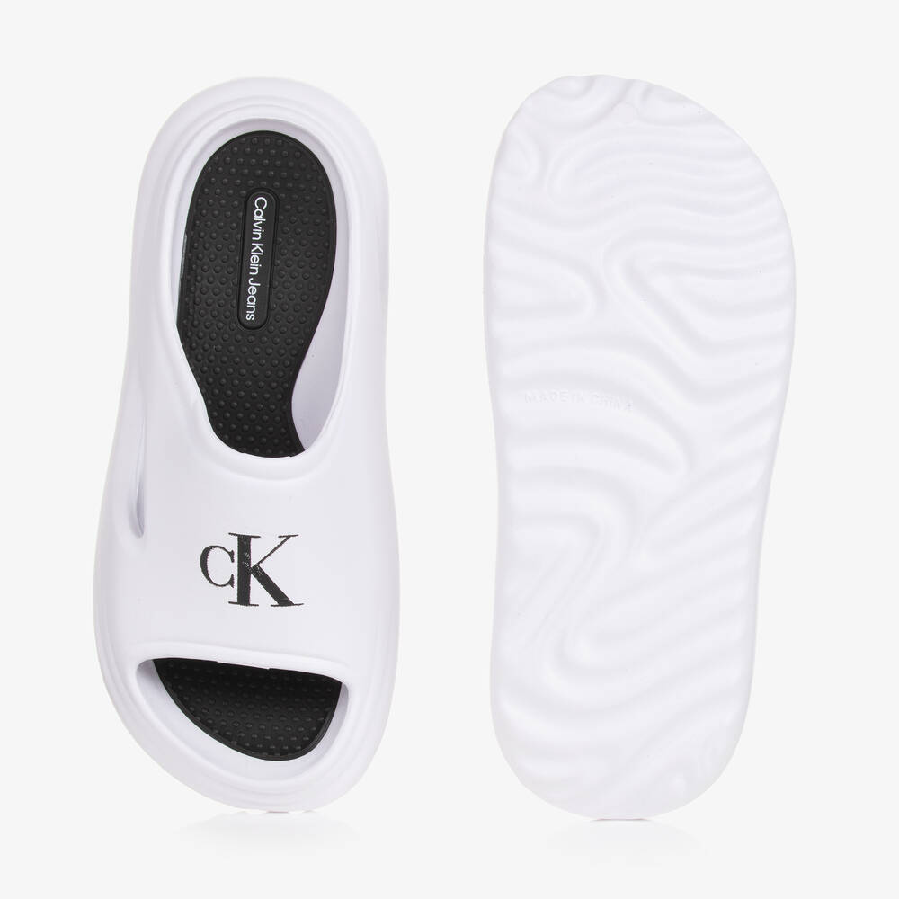 Calvin Klein-Teen White Monogram Sliders | Childrensalon Outlet
