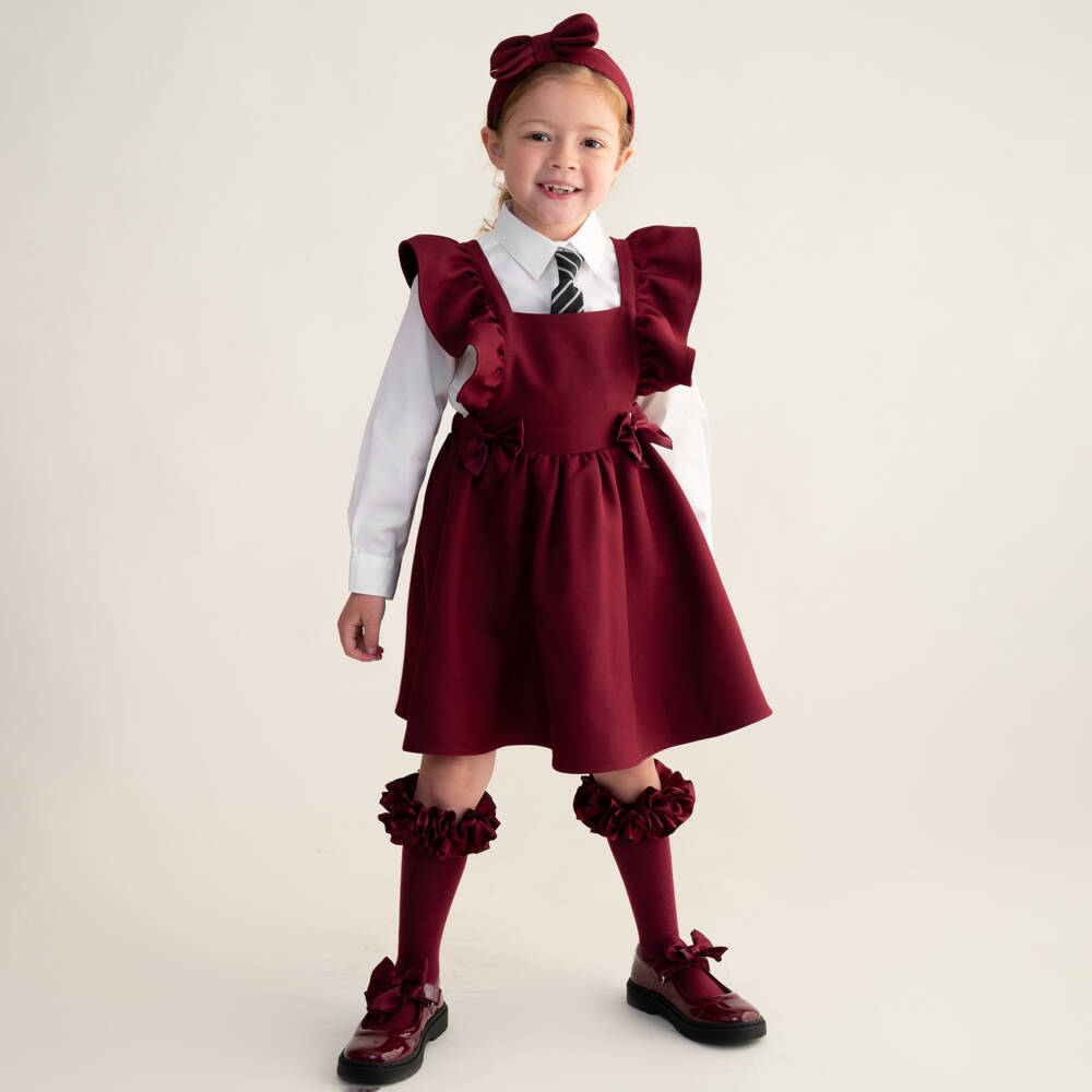 Caramelo Kids-Girls Burgundy Red Pinafore Dress with Ruffles & Bows | Childrensalon Outlet