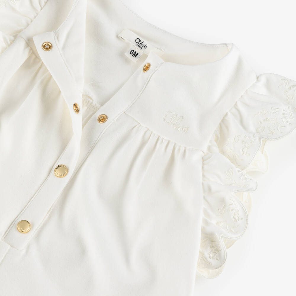 Chloé-Girls Off-White Cotton Ruffle Sleeve Playsuit | Childrensalon Outlet