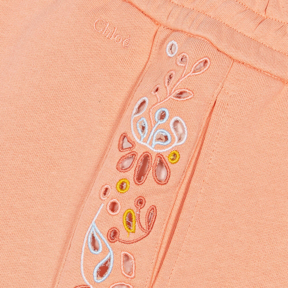 Chloé-Кораллово-оранжевые шорты с цветами | Childrensalon Outlet