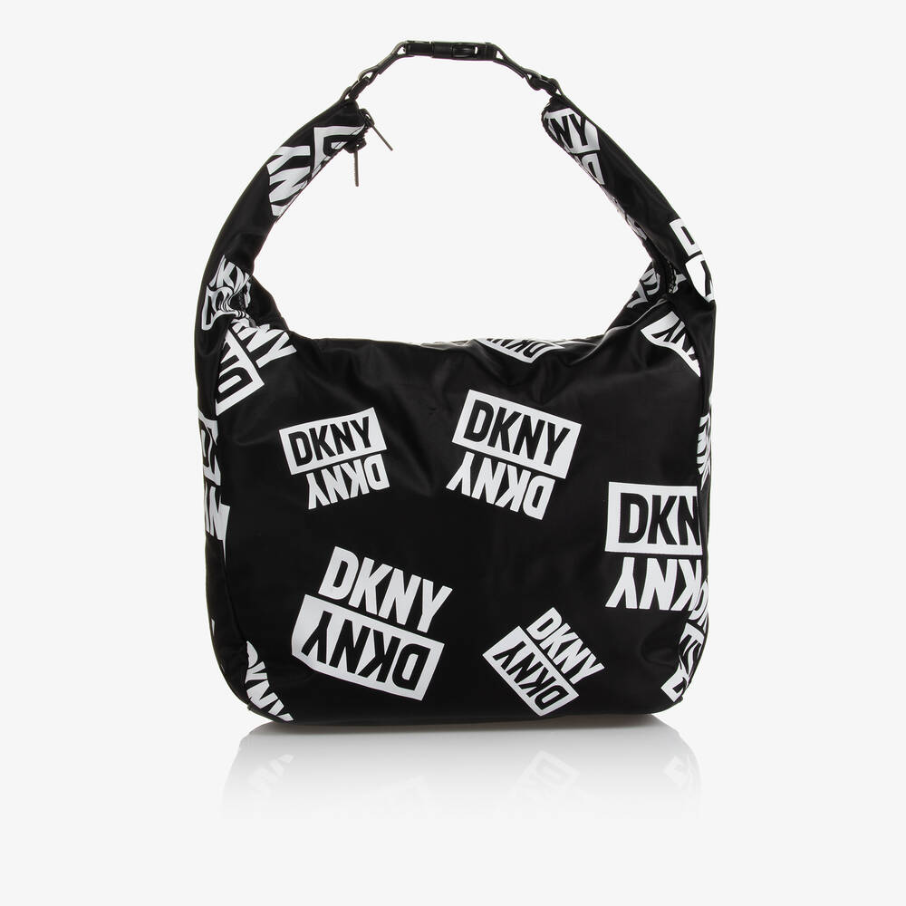 DKNY - حقيبة كتف كانفاس لون أسود وأبيض للبنات (48 سم) | Childrensalon