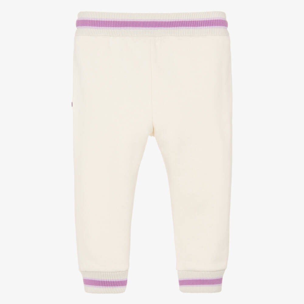 Dolce & Gabbana-Baby Girls Ivory Cotton Joggers with Purple Floral Detailing | Childrensalon Outlet