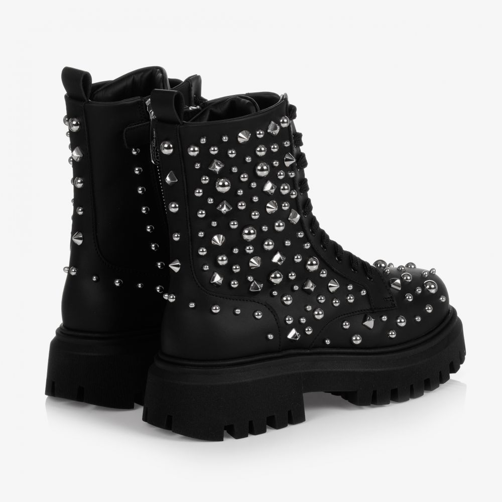 Boots cloutees on sale cuir