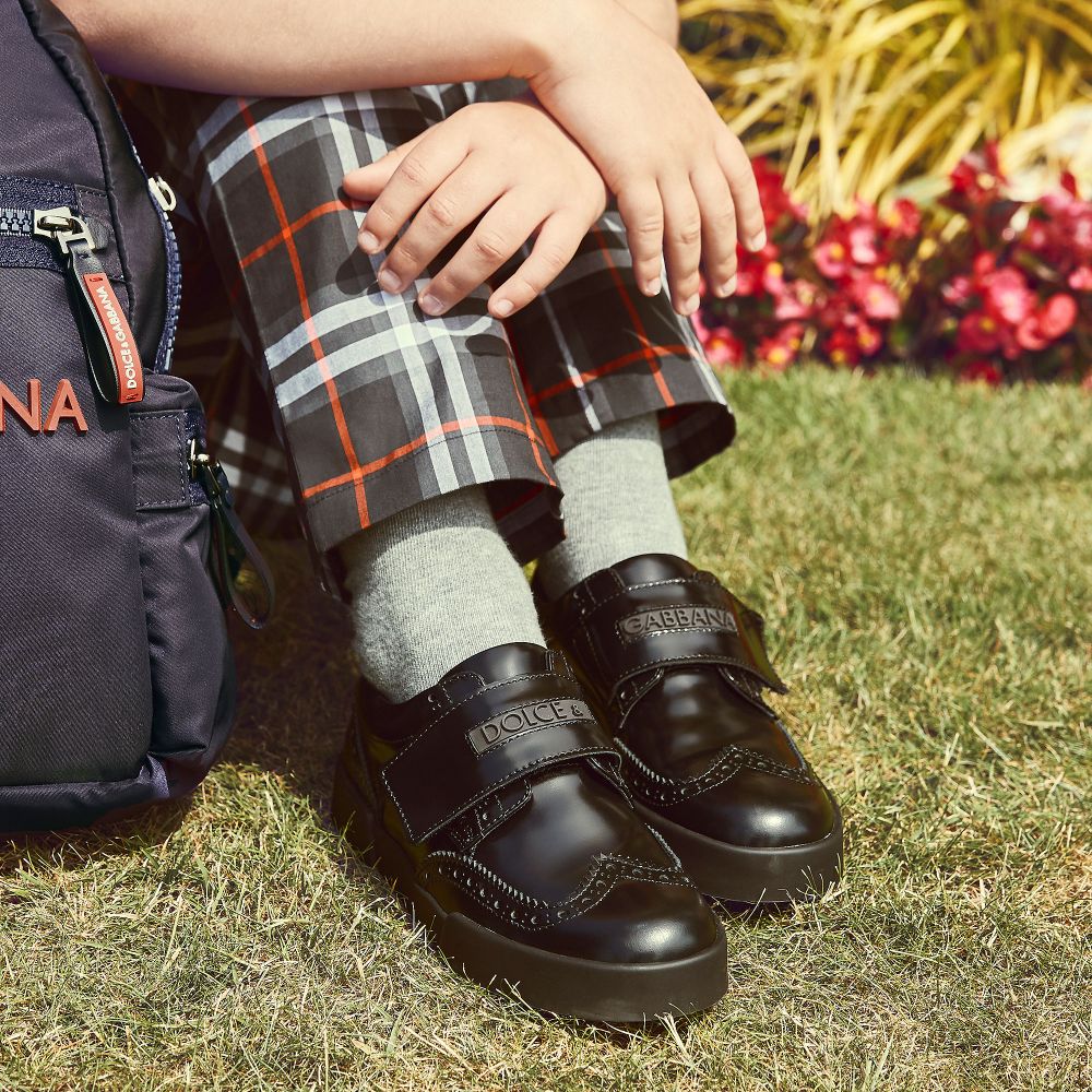 boys black brogues