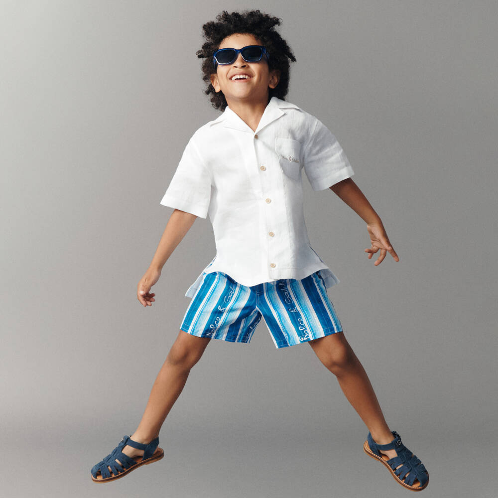 Dolce & Gabbana-Boys Blue Logo-Striped Swim Trunks | Childrensalon Outlet