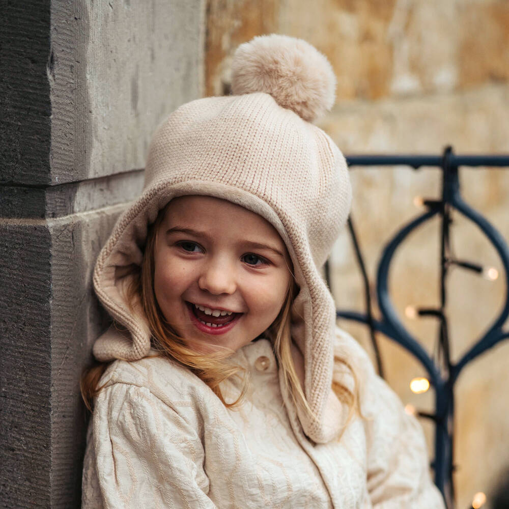 Donsje-Ivory Knitted Cotton Hat with Faux Fur Pom-Pom | Childrensalon Outlet