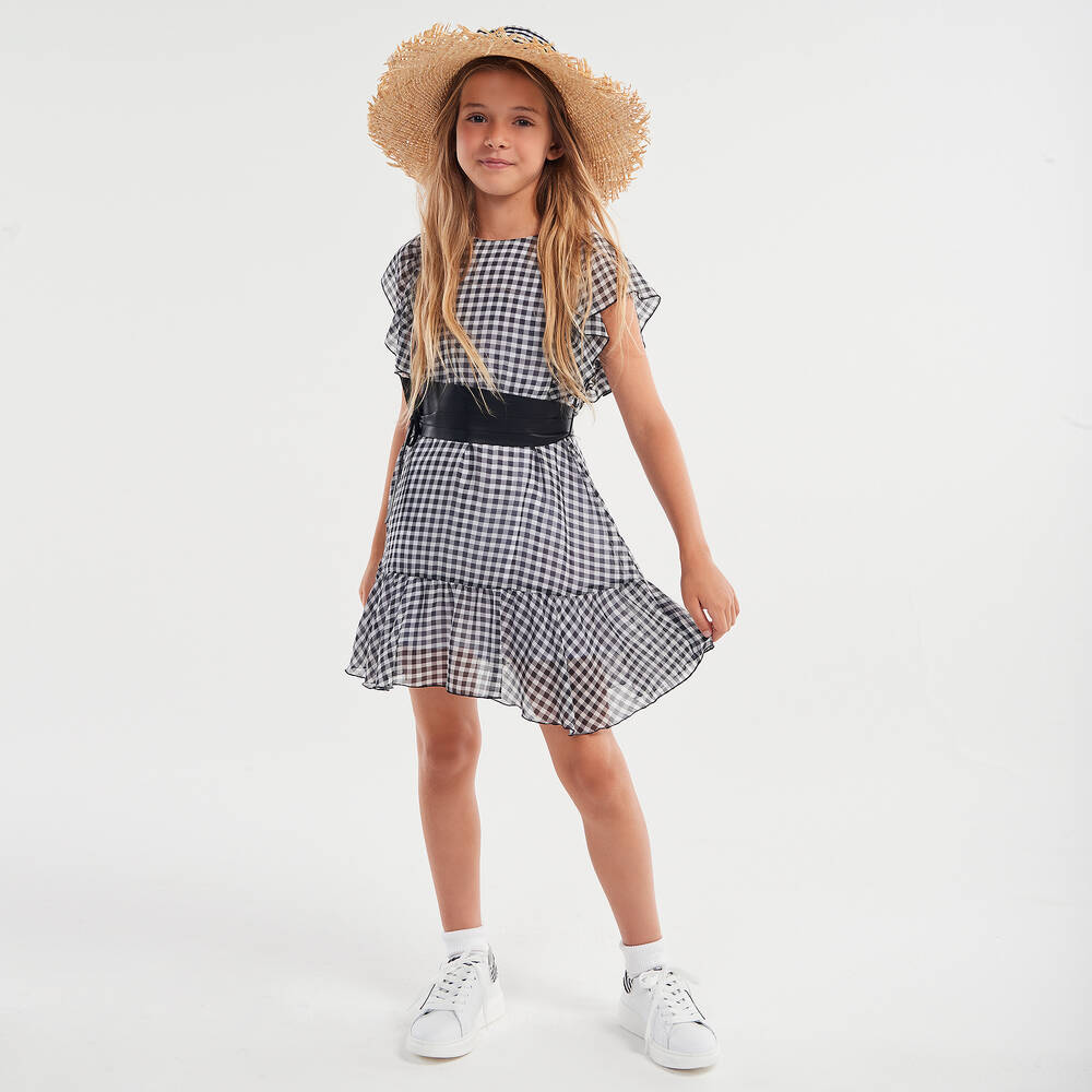 Check black and white dress shop