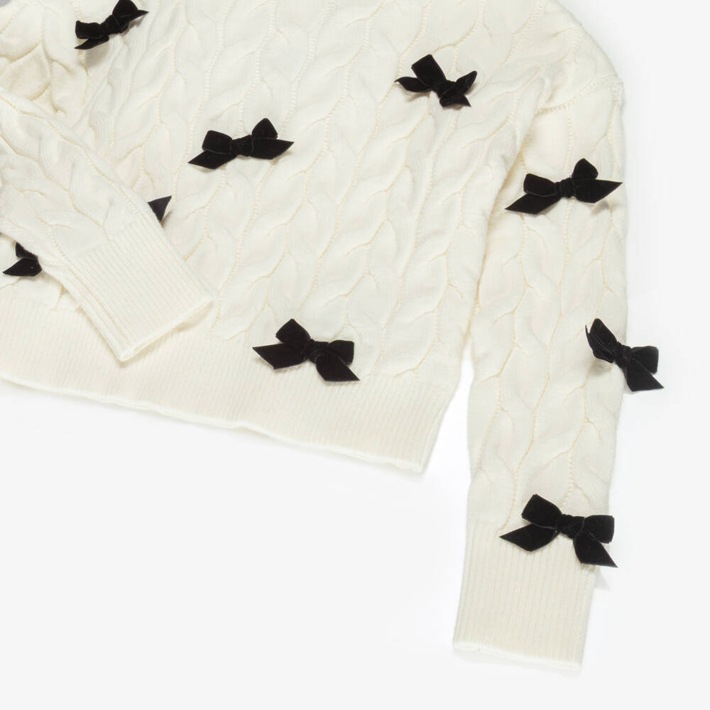 Elsy-Girls Ivory Cable Knit Jumper with Black Velvet Bows | Childrensalon Outlet