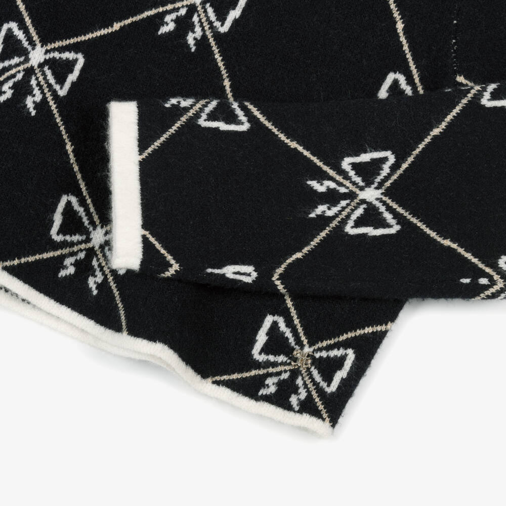 Abel & Lula-Girls Black Knitted Skirt Set with Bow Pattern | Childrensalon Outlet