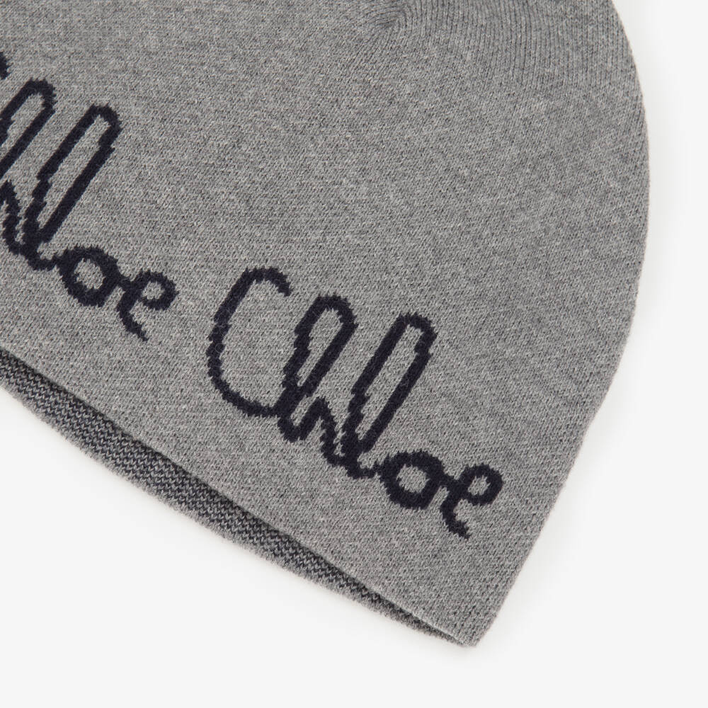 Chloé-Girls Grey Knitted Hat with Navy Blue Chloé Logo | Childrensalon Outlet