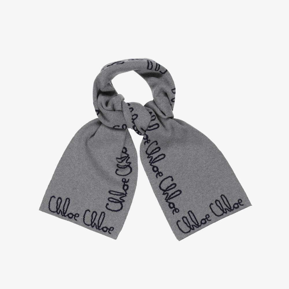 Chloé-Girls Grey Knitted Scarf with Navy Blue Chloé Logo | Childrensalon Outlet
