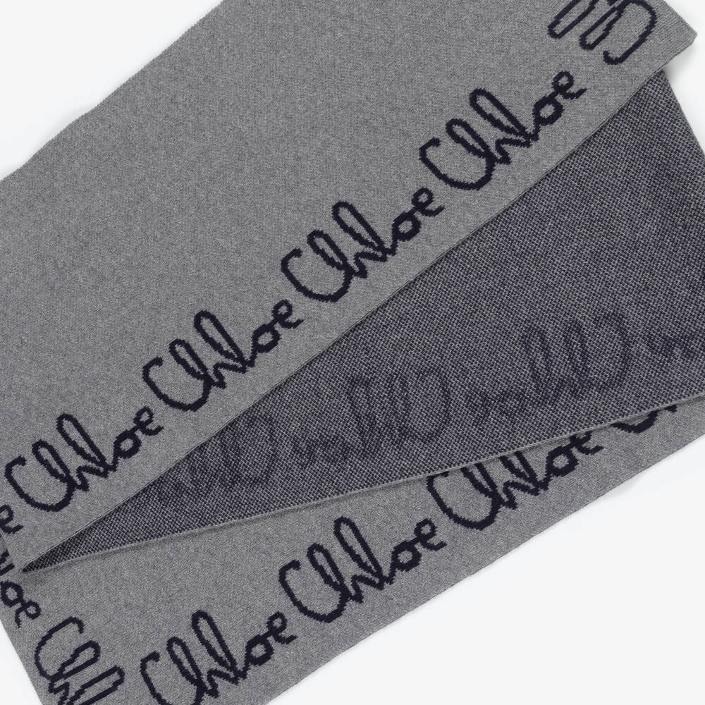 Chloé-Girls Grey Knitted Scarf with Navy Blue Chloé Logo | Childrensalon Outlet