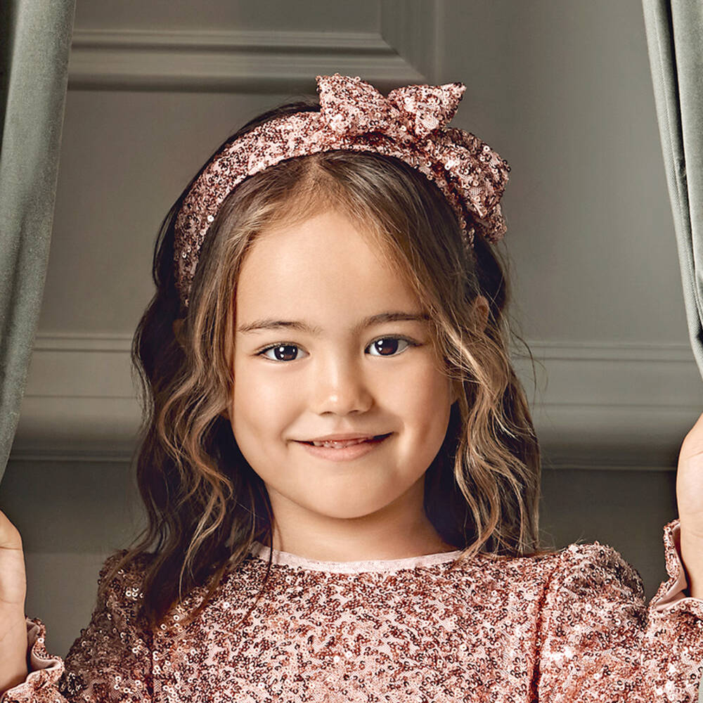 Abel & Lula-Girls Pink Sequinned Tulle Bow Hairband with Logo Charm | Childrensalon Outlet