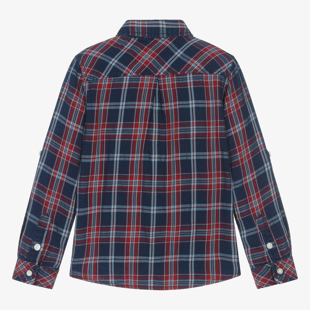Guess blue store and red shirt
