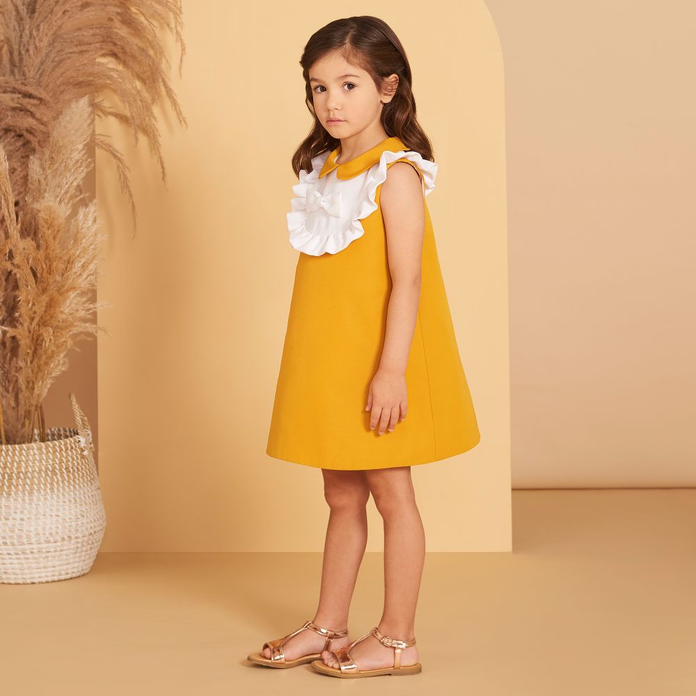 Robe jaune moutarde fille sale