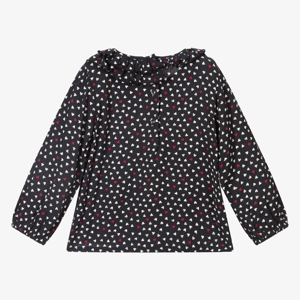 girls black and white polka dot shirt