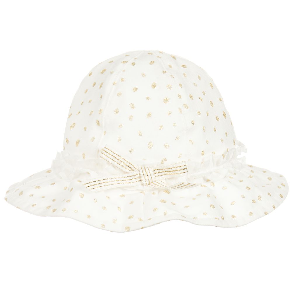 white and gold hat