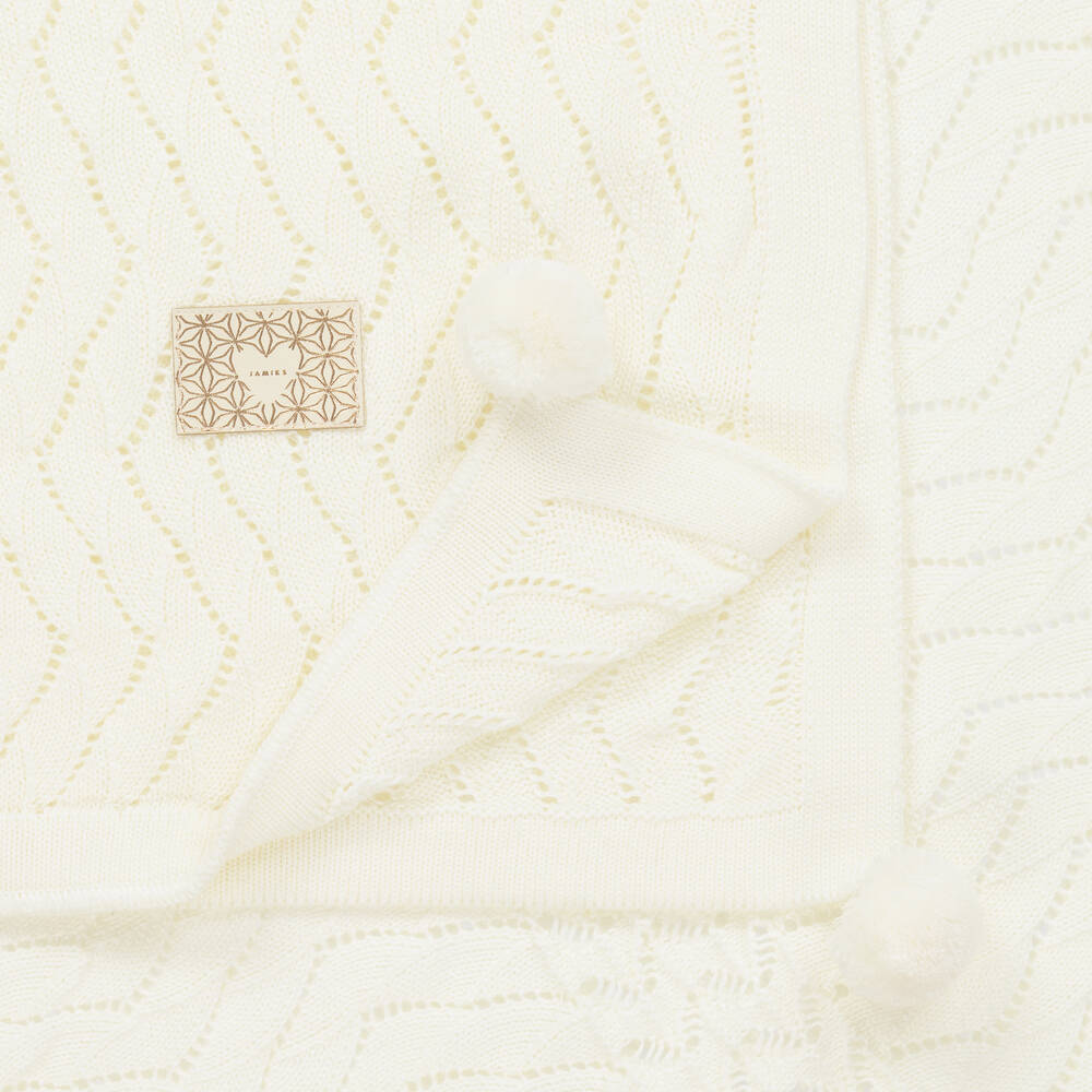 Ugg blanket with pom poms top
