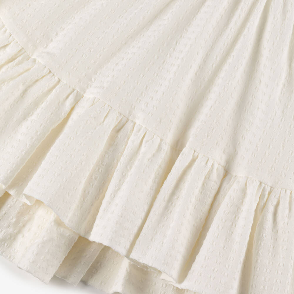 Jessie and James London-فستان قطن بطبقات وقصّة غير متماثلة لون عاجي | Childrensalon Outlet