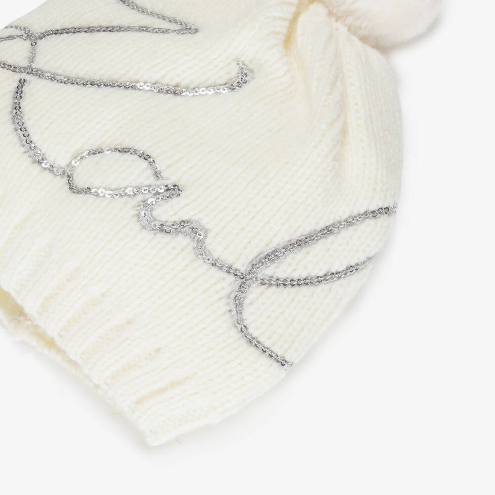 KARL LAGERFELD KIDS-Girls Ivory Knitted Bobble Hat with Sequin Logo | Childrensalon Outlet