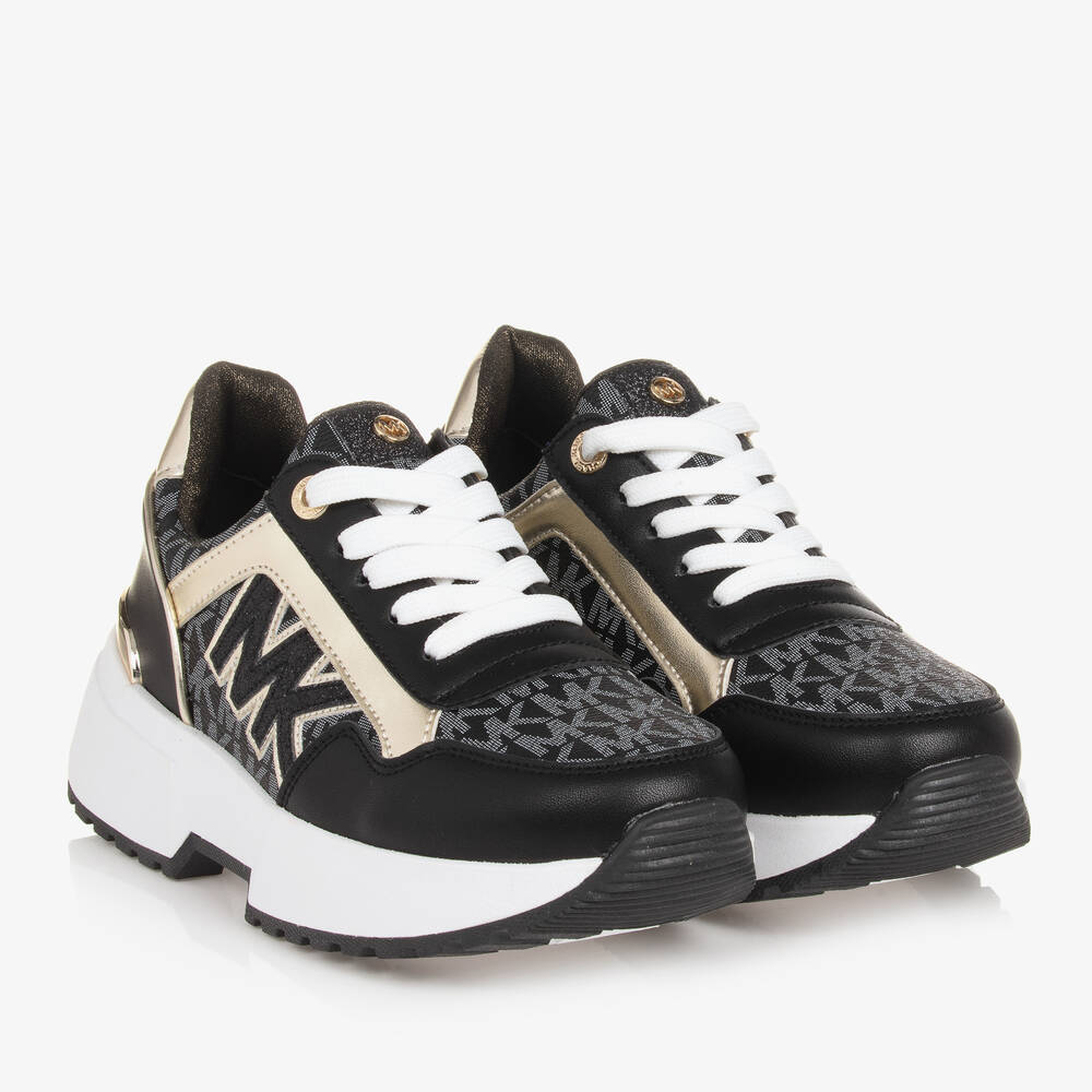 Michael kors trainers black and white best sale