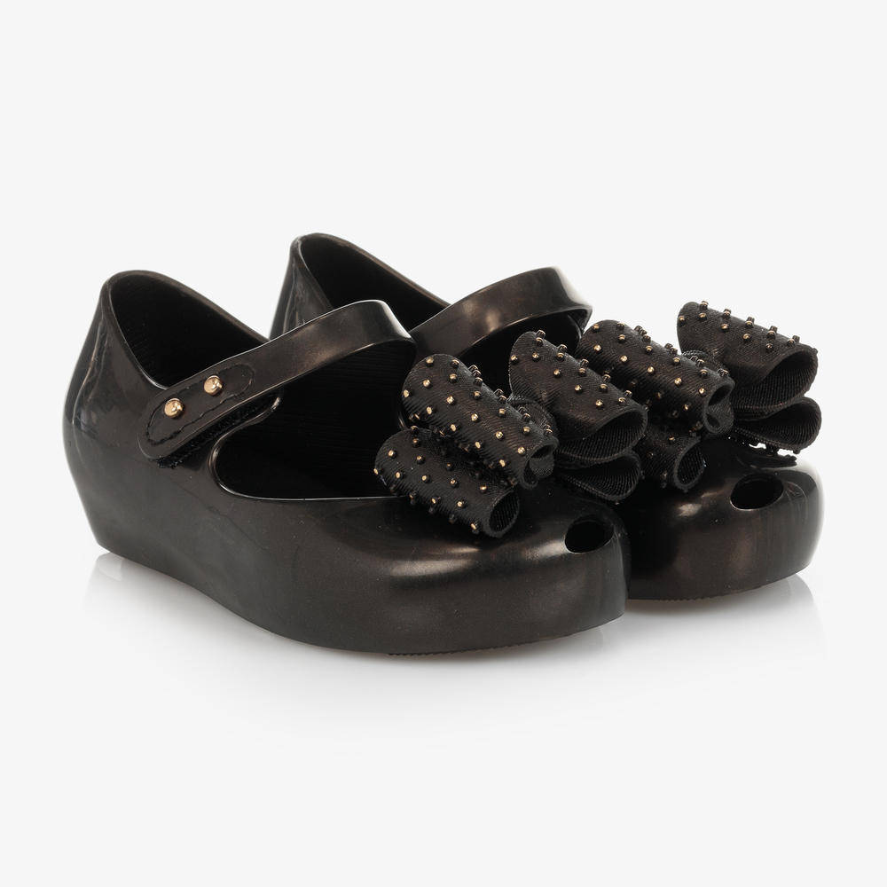 Mini Melissa - Черные резиновые туфли с бантиками | Childrensalon