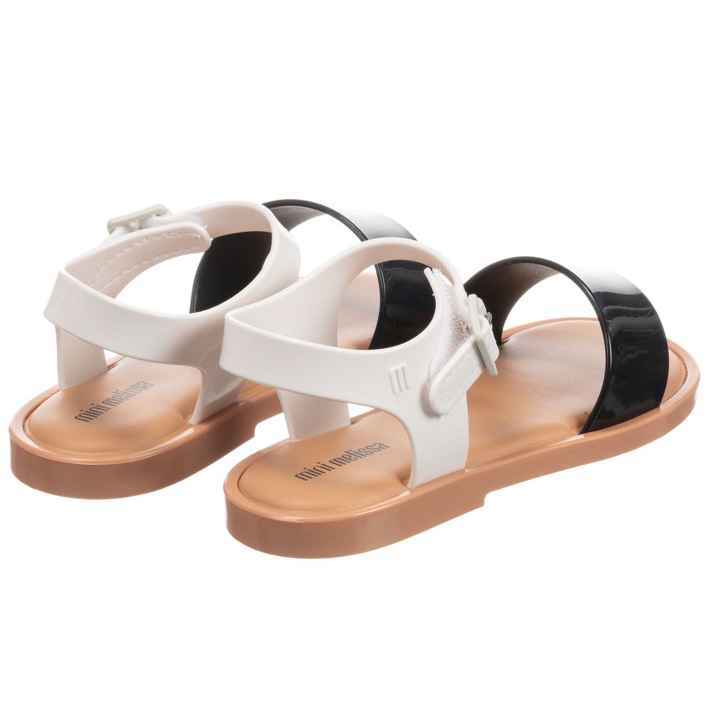 white jelly flip flops