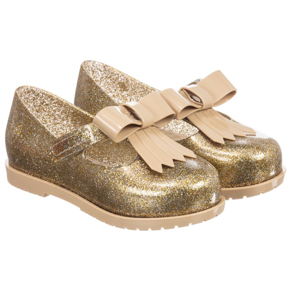 Mini Melissa - Золотистые туфельки с бантиками для девочек | Childrensalon