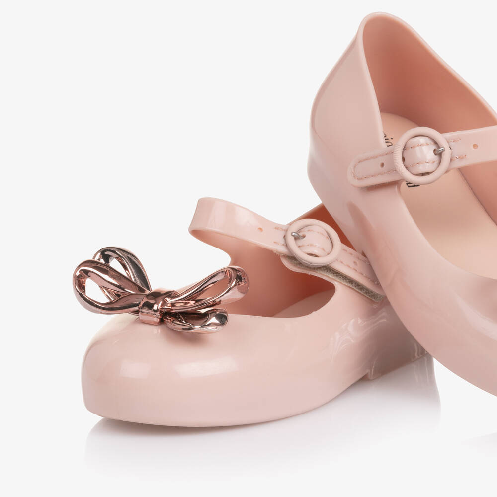 Mini Melissa-Girls Pink Jelly Pumps with Rose Gold Bow | Childrensalon Outlet