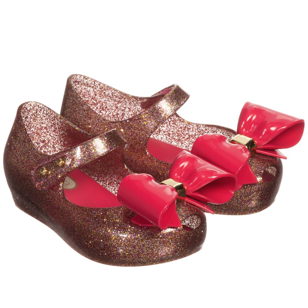Mini Melissa - Chaussures Rose Brillant À Nœud Papillon  | Childrensalon