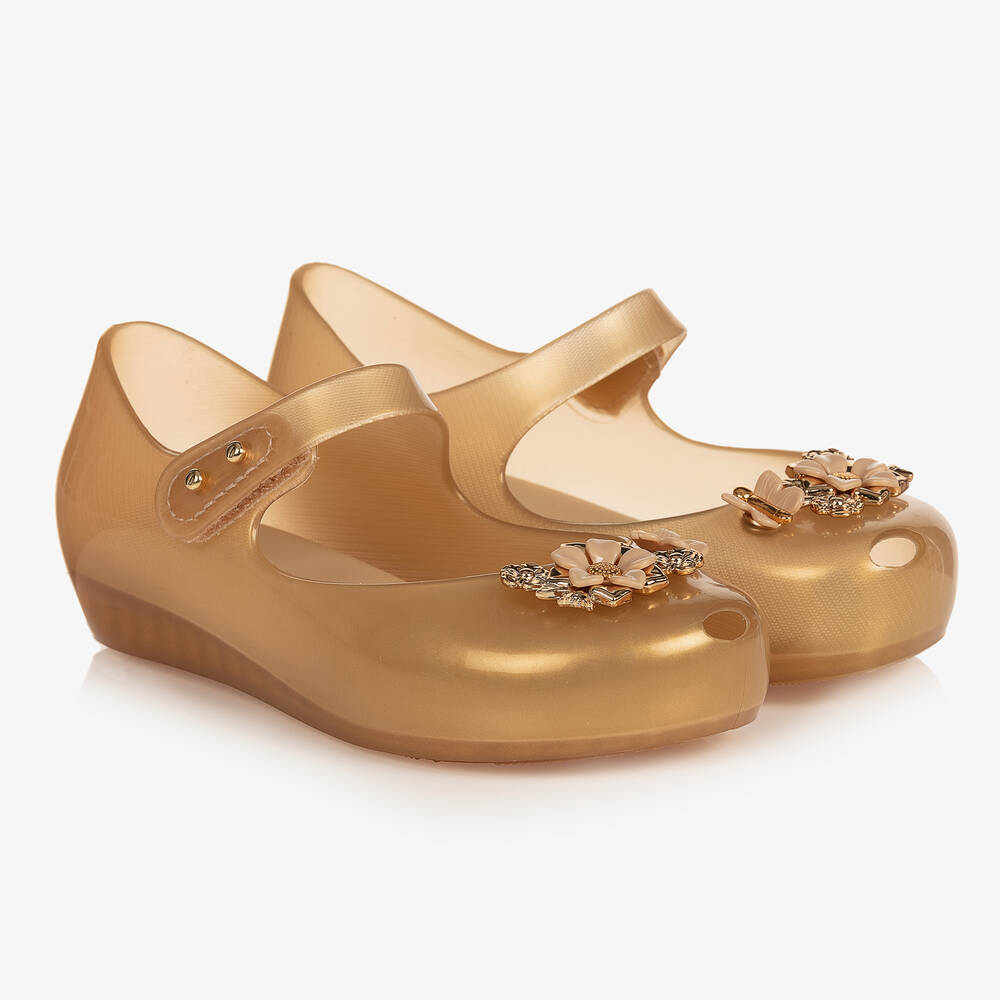 Mini Melissa - Золотистые резиновые туфли с цветами | Childrensalon