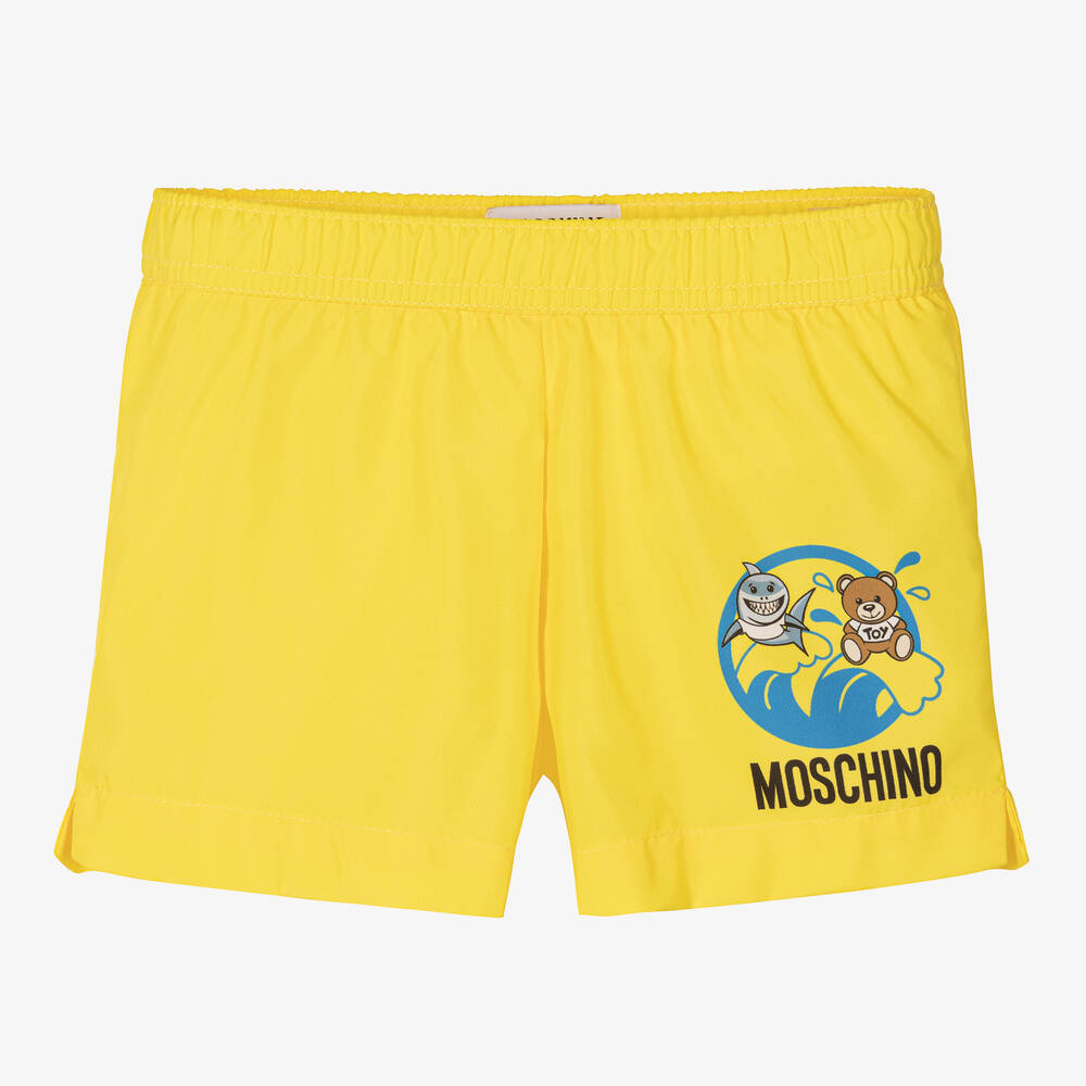 Moschino Baby - Желтые плавки-шорты с медвежонком | Childrensalon