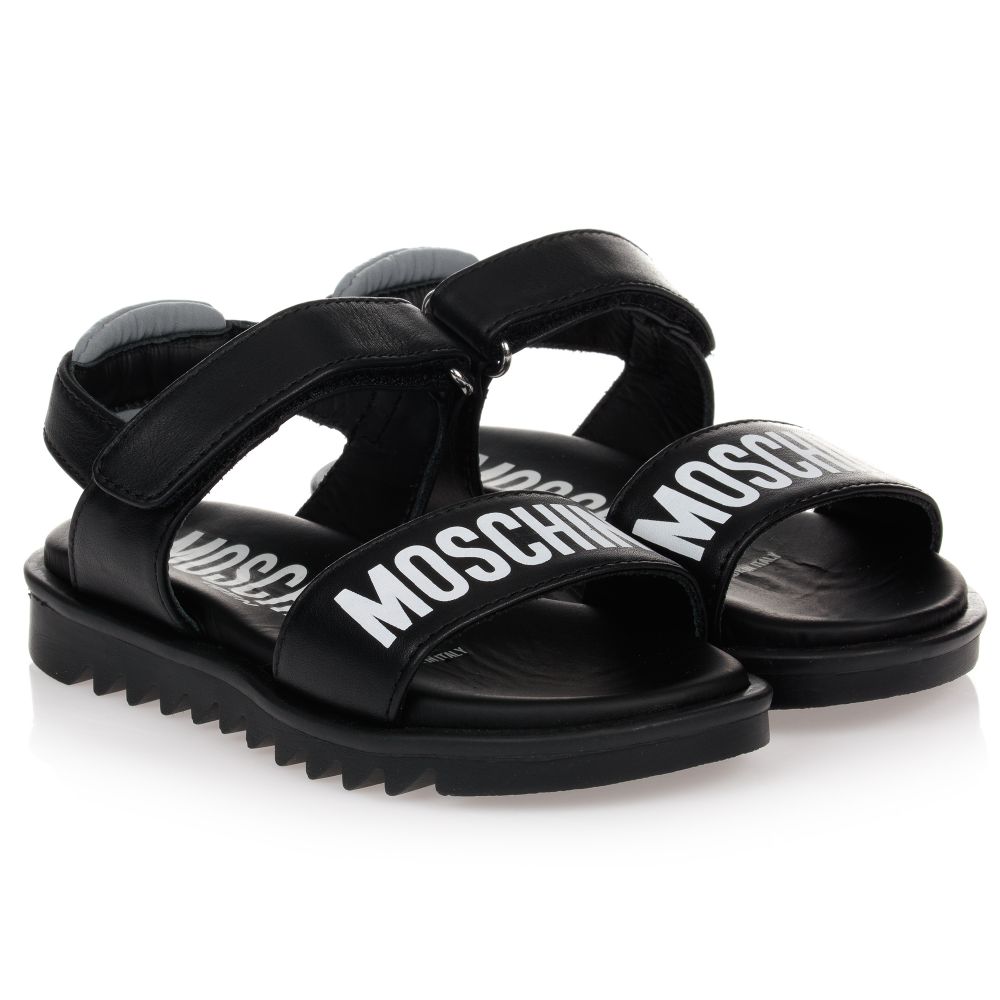 Moschino Kid-Teen - Schwarze Ledersandalen mit Logo | Childrensalon