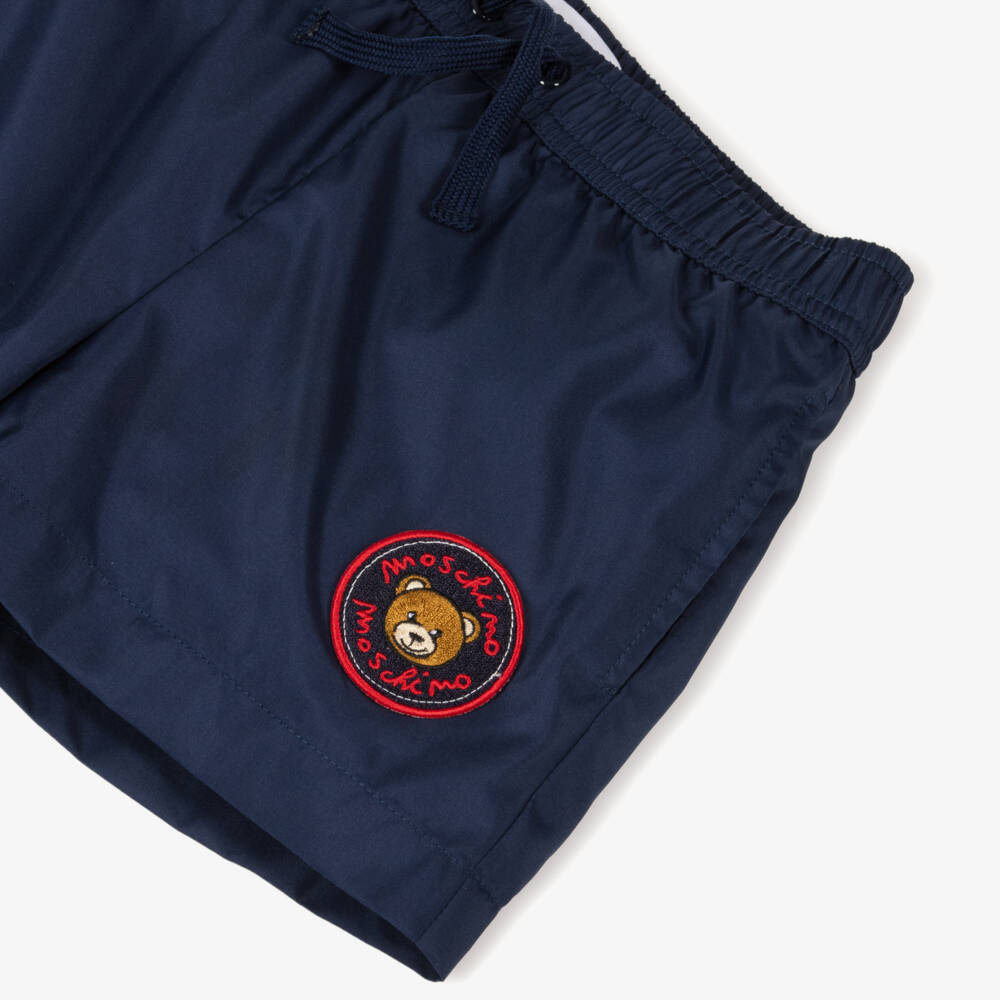 Moschino-Boys Navy Blue Logo Badge Swim Shorts | Childrensalon Outlet