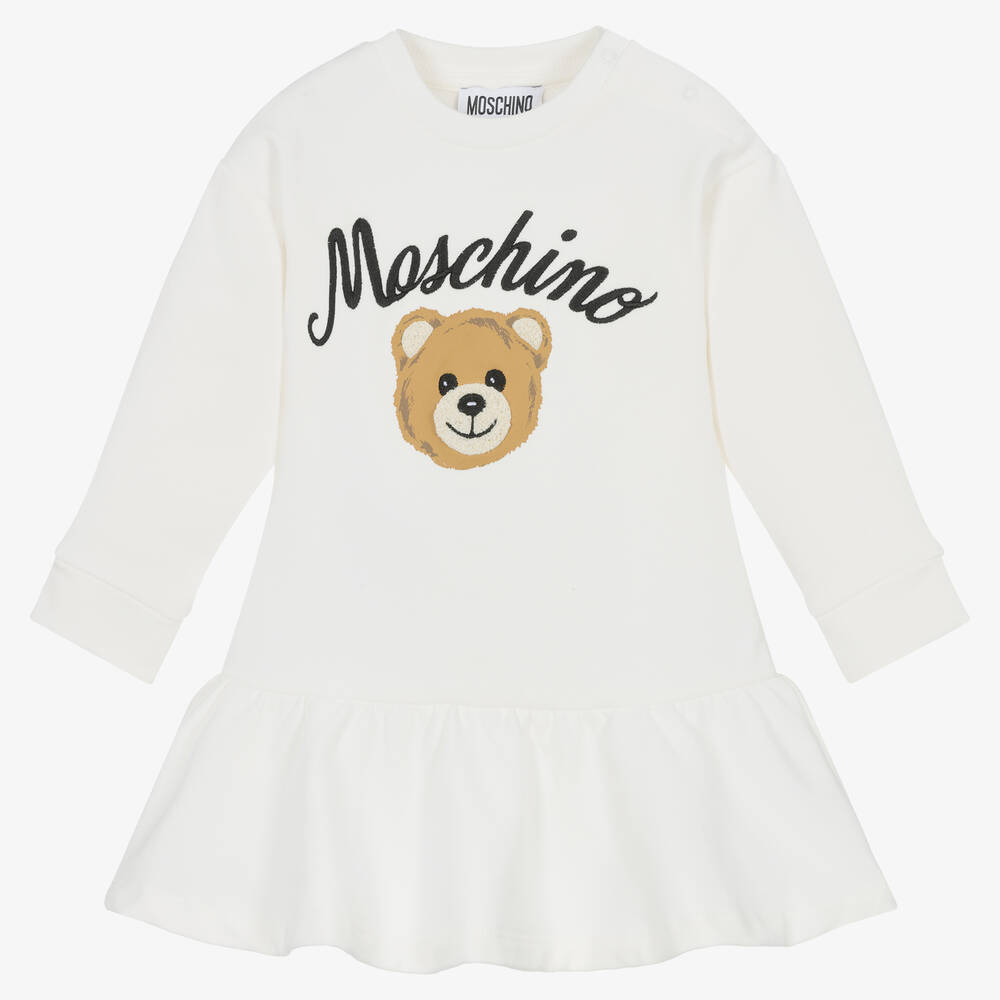 Moschino Baby - فستان قطن جيرسي لون عاجي بطبعة تيدي بير | Childrensalon
