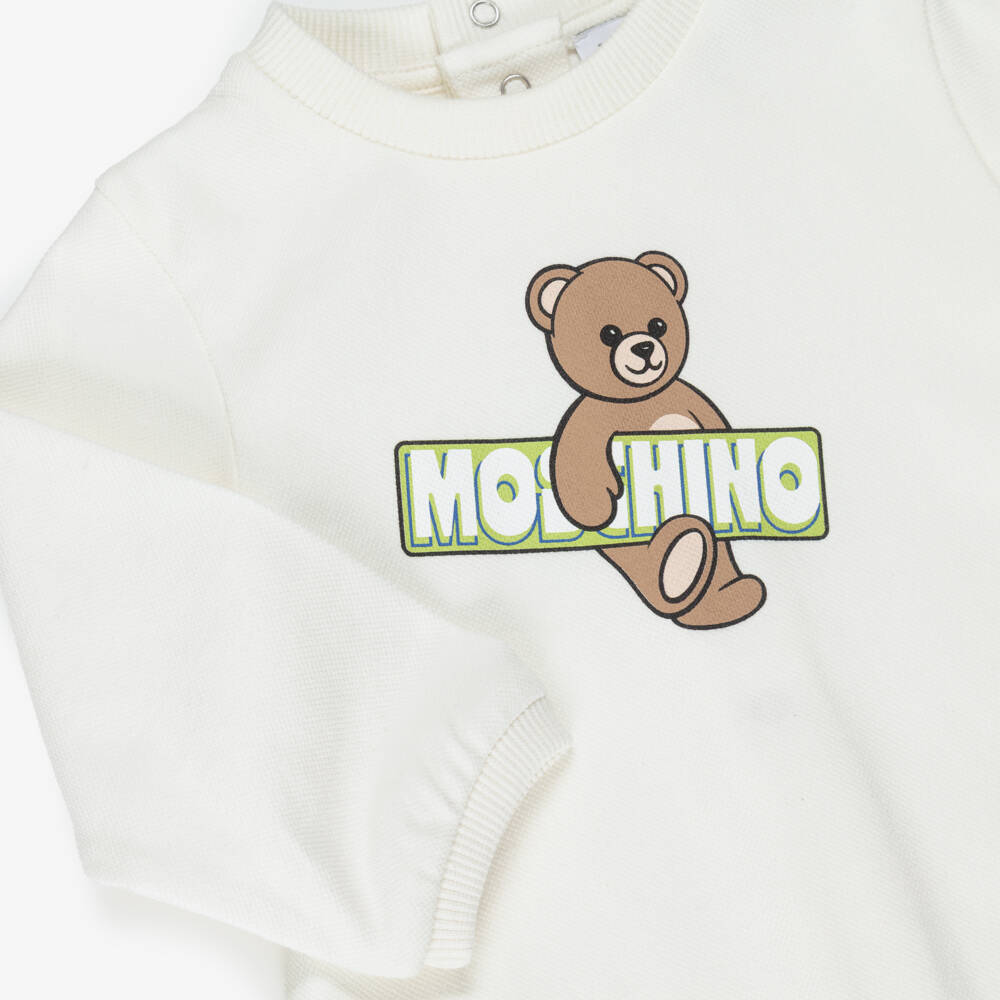 Moschino-Ivory Bear Babygrow | Childrensalon Outlet