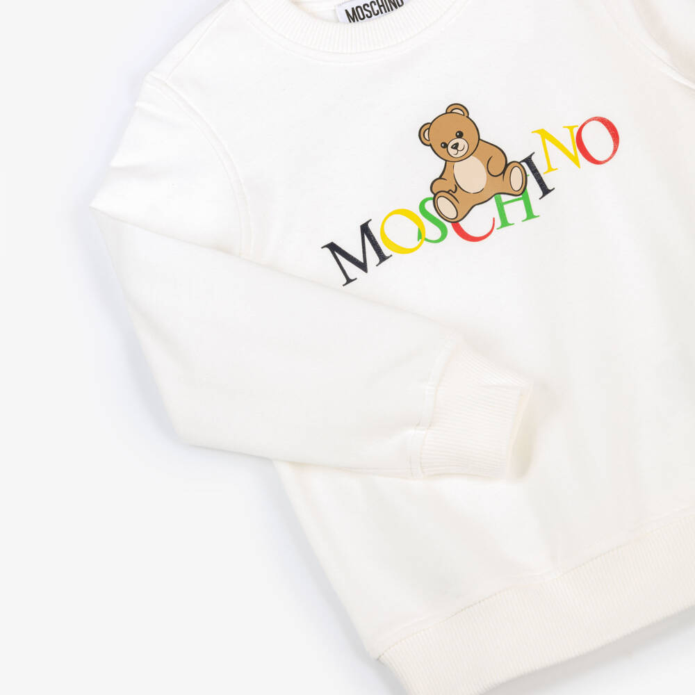 Moschino-Ivory Cotton Teddy Bear Sweatshirt with Colourful Logo | Childrensalon Outlet